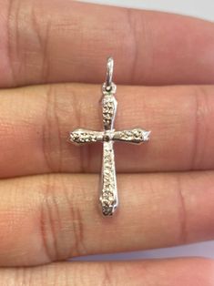 Small 18k Solid White Gold Cross with Flower Pendant in Diamond Cut Made with Real 18k Solid Gold Weight - 1.41 Grams Width - 16.5mm Free Domestic Shipping and One-Day Handling FREE Gift Box! About Us With 30 years of jewelry experience and a Top Rated Seller on eBay since 2011, Goldland Jewelry strives to provide quality handcrafted jewelries at the best price. Pricing are set to sell out quick! 30 Day Return after delivery for full refund. Any questions I'll be happy to answer :) White Gold Cross Charms For Anniversary, White Gold Crucifix Jewelry For Anniversary, White Gold Crucifix For Anniversary, White Gold Diamond-cut Crucifix Jewelry, White Gold Diamond Cut Crucifix Jewelry, White Gold Crucifix With Diamond Cut, Sterling Silver Cross Jewelry Stamped 14k, Stamped 14k White Gold Cross Jewelry, Silver Cross Pendant For Wedding