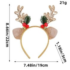 the reindeer headband has two antlers on it's ears and is decorated with holly