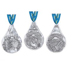 three medals with different designs on them