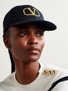 Valentino Garavani's baseball cap is embroidered with the iconic 'VLOGO' in gold threads - the first iteration debuted in 1968 and has become synonymous with the house ever since. Made from cotton-canvas, it has a sturdy brim and an adjustable tab to control the fit. Luxury Baseball Cap With Embroidered Logo And Visor, Luxury Baseball Cap With Embroidered Logo, Luxury Embroidered Logo Snapback Baseball Cap, Luxury Embroidered Snapback Baseball Cap, Luxury Snapback Baseball Cap With Embroidered Logo, Luxury Baseball Cap With Logo Patch, Luxury Flat Brim Baseball Cap With Embroidered Logo, Luxury Baseball Cap With Embroidered Logo And Flat Brim, Denim Flats