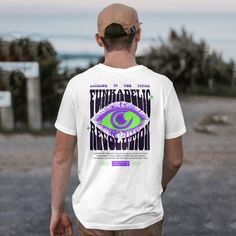 Stand out in the crowd with this retro vintage trippy neon green and purple eye graphic skateboard fashion t-shirt. Perfect for skaters and streetwear enthusiasts, this unique urban style tee is designed to turn heads and make a statement. Crafted for comfort and durability, it's an ideal addition to your trendy grunge wardrobe. 🛹 Unique Design: Features an eye-catching neon green and purple eye graphic, perfect for those who love bold and artistic designs. 👕 Comfortable Fit: Made from high-qu Purple Band Merch T-shirt For Streetwear, Retro Streetwear T-shirt With Back Print, Summer Rave T-shirt With Graphic Print, Rave Graphic T-shirt For Streetwear, Retro T-shirt For Music Festivals And Streetwear, Rave Style Graphic T-shirt For Streetwear, Rave T-shirt With Screen Print For Streetwear, Rave T-shirt With Graphic Print For Music Festival, Summer Rave T-shirt With Graphic Design