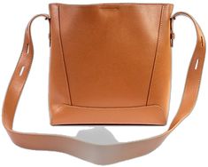 Chic Rectangular Shoulder Bag With Leather Backing, Square Leather Bucket Bag For Travel, Square Leather Travel Bucket Bag, Office Leather Tote Bag, Office Shoulder Bag With Double Handle And Leather Backing, Office Tote Bags With Leather Backing, Leather-backed Tote Bags For Office, Daily Use Square Shoulder Bag With Leather Lining, Cognac Soft Leather Bucket Bag For Shopping