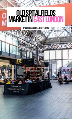 the inside of an old market in east london with text overlay that reads old spitfields market in east london