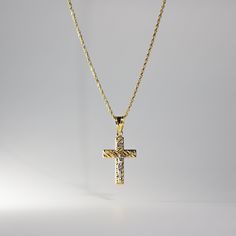 *The pendant COMES WITH the chain if you select one of our chain options * 5% OFF TOTAL PRICE, when you purchase the chain and pendant combo (The price shown is after the discount) Our 14K gold crucifix cross pendant featured a captivating intertwining design that adds a modern and stylish touch to the classic religious emblem, creating a unique and meaningful accessory. Meticulously crafted with precision, this pendant showcases the enduring beauty of 14K gold. The criss-cross pattern adds a co Chain Necklace With Cross Pendant As A Gift, Yellow Gold Cross Jewelry With Curb Chain, Yellow Gold Cross Necklace With Curb Chain, Gift Jewelry Chain With Crucifix Shape, Gold Cross Necklace With Curb Chain, Gold Crucifix Necklace With Diamond Cut, Gold Cross Pendant Necklace With Chain, Gold Pendant Cross Necklace With Chain, Elegant Crucifix Chain Necklace