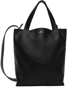 Pebble-grained leather tote in black. · Twin carry handles · Detachable crossbody strap · Logo stamp at face · Open throat · Zip pocket at interior · Suede lining · H10 x W9.5 x D3.25 Supplier color: Black Black Textured Leather Bag With Round Handle, Black Pebbled Leather Bucket Bag For Everyday, Black Pebbled Leather Bucket Bag For Travel, Shopper Tote, Logo Stamp, Crossbody Strap, A P, Leather Tote, Apparel Accessories