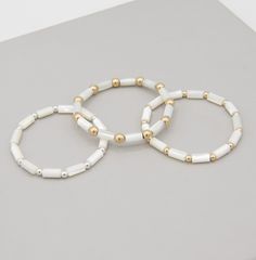 Discover the effortless elegance of our latest ivory Mother-of-Pearl Tube Bracelet, designed for both versatility and style. The bracelet showcases sleek ivory mother-of-pearl tubes, accented with your choice of 4mm or 6mm 14k gold-filled or sterling silver beads, allowing you to customize the look to suit your personal style. The comfortable stretch design makes it perfect for easy, everyday wear, whether on its own or stacked with your favorite pieces. Crafted with high-quality materials, this Acrylic Containers, Tube Bracelet, Chains Necklaces, Effortless Elegance, Tube Beads, Pendant Bracelet, Sterling Silver Bead, Bracelet Stack, Metal Beads