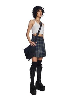 cuz play by your own rules, babe! This pleated mini skirt has a belted waist with O-ring hardware, a distressed raw edge hem, a back zip closure, and a high waist fit. Edgy Mini Skirt For School, Edgy Pleated Skort For Alternative Fashion, Punk Pleated Skirt For School, Punk Style Pleated Skirt For School, Edgy Mini Skort For Streetwear, Grunge Mini Skirt With Belt Loops, Edgy Pleated Skirt For School, Edgy Skirt With Belt Loops For Fall, Edgy Fitted Cutoff Mini Skirt