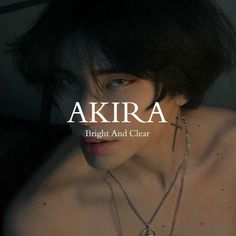 a woman with necklaces on her neck and the words akra above her chest