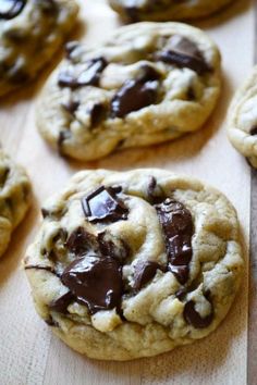 chocolate chip cookies on a cutting board ready to be eaten