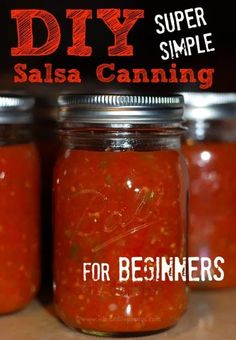 three mason jars filled with salsa sitting on top of a wooden table next to the words diy super simple salsa canning for beginners