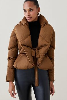 Turn Up The Volume In This Quilted Puffer Coat. Perfectly Epitomising The Duvet-Style Outerwear Trend, It Shows Off Oversized Lapels, A Directional Puffy Finish And Waist-Defining Belt Tie To Draw The Eye To The Narrowest Part Of Your Figure. Fall Puffer Quilted Jacket, Duck Down Puffer Outerwear For Fall, Fall Puffer Jacket With Padded Collar, Fall Duck Down Puffer Quilted Jacket, Puffy Duck Down Outerwear For Fall, Spring Puffer Outerwear With Duck Down, Fall Down Puffer Jacket, Chic Quilted Outerwear For Winter, Spring Duck Down Puffer Jacket With Padded Collar