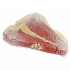 a piece of raw meat sitting on top of a white surface