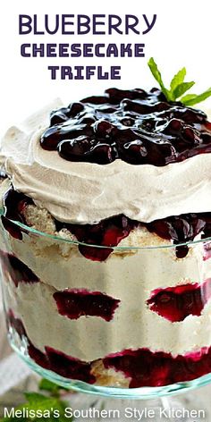 a blueberry cheesecake trifle in a glass dish