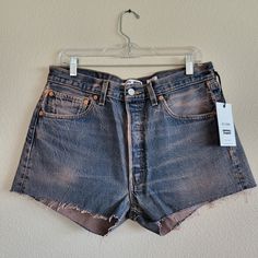 New With Tags Medium Wash Denim W/Rose Tint Button Fly High Rise, Relaxed Fit 100% Cotton Size 29 Retail $275 Waist: 17" Rise: 11.5" Hips: 22" Inseam: 2.5" Fitted High Waist Faded Bottoms, Faded Denim Bottoms With Button Closure, High Rise Relaxed Fit Faded Shorts, Dark Wash Short Bottoms, Fitted High Waist Shorts With Five Pockets, Faded High Waist Bottoms With Relaxed Fit, Faded High Waist Relaxed Fit Bottoms, Relaxed Fit High Waist Faded Bottoms, High Waist Faded Bottoms With Relaxed Fit