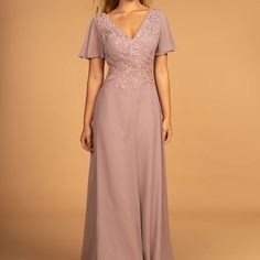 Brand New Women Long Beautiful Evening Dresses With V-Neckline. Perfect Choice For The Current And Upcoming Season. Elegance Of Mauve Color Will Give You Confidence And Will Not Leave Without Attention Of The Others. Material: 100% Polyester V- Neckline Maxi Long Dress A-Line Dress Style: V- Neckline,Short Sleeves, Sexy Mesh Embroidery,A-Line Silhouette, Maxi Length, Concealed Back Zipper Makes It Easy To Put On And Take Off. Occasion: Formal, Evening,Guest Of Wedding, Bridal,Mother Of Bride Gowns Purple, Chiffon Long Dress, Mother Dresses, Mother Of The Bride Dresses Long, Purple Dresses, Long Gown Dress, Mother Of Groom Dresses, Groom Dresses, Embroidered Bodice