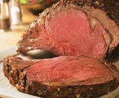 the best prime rib roast is on a white plate