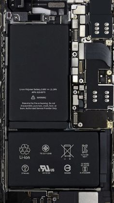 the back side of an iphone that is being dismantled