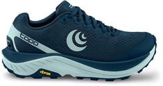 a blue and white running shoe with the moon on it's upper soles