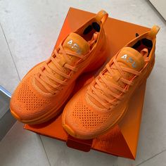 Women’s Size 5.5 Apl X Mclaren Hyspeed Sneakers In Orange. Brand New In Box With Tags. Functional Gym Running Shoes With Abzorb Midsole, Functional Running Shoes With Abzorb Midsole For Gym, Orange Running Shoes With Air Cushioning For Light Sports, Orange Athleisure Running Shoes, Orange Sporty Sneakers With Shock Absorption, Sporty Orange Sneakers With Shock Absorption, Orange Athleisure Running Shoes With Air Cushioning, Orange Lace-up Sneakers For Marathon, Orange Athleisure Running Shoes With Air Max Cushioning