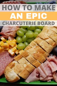 a platter with ham, grapes and bread on it that says how to make an epic charcuterie board