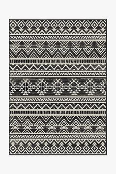 a black and white rug with geometric designs