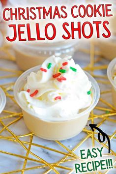 christmas cookie jello shots in small plastic cups with sprinkles on top