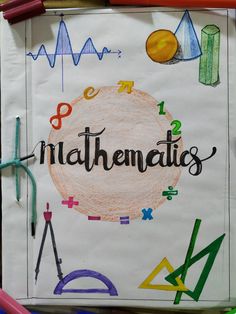 a piece of paper with the words mathemalias written on it next to crayons and pencils