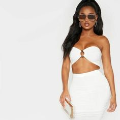 This Crop Top Is Perfect For Any Weekend Occasion W/ Your Dolls. Featuring A Cream Ruched Material With A Ring Design, Wear This Crop Top Bandeau With A Matching Bodycon Skirt And Complete The Look With Mule Heels And A Clutch Bag. Comes In Original Bag Size: 14 Measurements: Bust Across: 15"; Bust Height: 7" Length Approx 14cm/5.5" 95% Polyester 5% Elastane I Welcome All Reasonable Offers! White Sleeveless Tube Top For Night Out, Flirty Fitted White Tube Top, Flirty White Bandeau Tube Top, White Summer Tube Top With Sweetheart Neckline, White Sweetheart Neckline Tube Top For Summer, White Fitted Strapless Crop Top, Flirty White Crop Top For Party, White Sleeveless Tube Top For Day Out, Flirty White Tube Top For Night Out