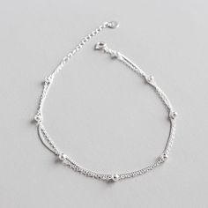 Balls Size: 3mm Line Width: 1mm/1.1mm Chain Length: 195mm + 25mm Adjustable Metal Material: Solid 925 Sterling Silver Metal Electroplating: Rhodium Total Weight: 1.86g Anklet Silver, Silver Ankle Bracelet, Foot Bracelet, Freshwater Pearl Drop Earrings, Wedding Silver, Silver Anklet, Anklets Boho, Women Anklets, Sterling Silver Anklet