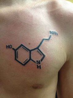 a man with a tattoo on his chest has the chemical symbol for h2o