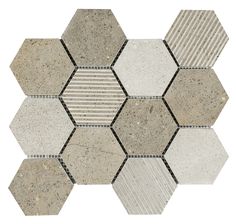 a hexagonal tile pattern with several different colors and patterns on it's sides