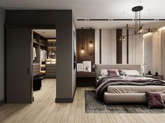 a bedroom with a large bed and closets in the back ground, next to a walk - in closet