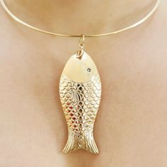 This is part of Chairish’s Fine Jewelry assortment.  Fantastic simple and stunning fish pendant. 14 karat gold. Can be worn alone or added to a grouping. Measures 3 inches long. Measurement does not include gold loop. Elegant 14k Gold Fish-shaped Jewelry, Elegant Fish-shaped Formal Jewelry, Elegant Yellow Gold Fish Shaped Necklace, Fish Pendant, Gold Fish, Accessories Jewelry Necklace, Goldfish, Fine Jewelry, Fish