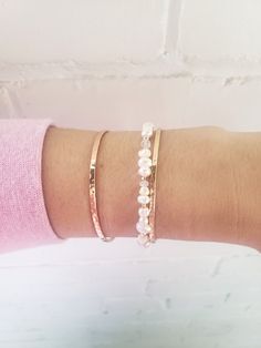 * This dainty bracelet is perfect for a wedding or layered with bangles! Dress it up or down. * Genuine freshwater pearls are arranged thoughtfully among 14k gold filled beads, and faceted rainbow moonstone. No one of these bracelets will be exactly the same, making each one unique 💫 * Secure with all 14k gold filled findings and easy to use lobster clasp. * Made from top quality materials, gold fill won't tarnish or turn, wear 24/7. **Pro tip** For measuring your wrist- If you don't have a fle Feminine Pearl Drop Bracelets, Dainty Stackable Pearl Beaded Bracelets, Dainty Pearl Stackable Beaded Bracelets, Dainty Stackable Pearl Bracelet, Elegant Stackable Beaded Bracelets In 14k Gold, Dainty Rose Gold Everyday Bangle, Dainty Stackable Pearl Bracelet For Everyday, Adjustable Bangle Bracelet With Pearl Drop, Dainty Pearl Bracelets For Anniversary