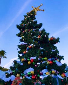 a large christmas tree with decorations on it