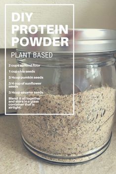 a jar filled with dirt sitting on top of a counter