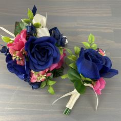 two bridal bouquets with blue and pink flowers