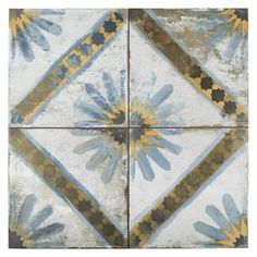 an artistic tile design with blue and yellow flowers