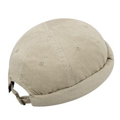 the hat is beige and has an adjustable brimmed strap around it's peak