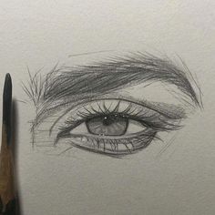 a pencil drawing of an eye with long lashes