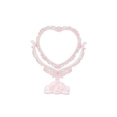 a pink heart shaped cake topper on a white background