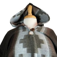 Discover the perfect blend of style and coziness with our women's and men's hooded alpaca poncho. Made from luxurious alpaca wool, this versatile garment is designed to keep you warm and fashionable. Shop now and elevate your winter wardrobe with our premium hooded alpaca poncho.- Very soft and warm- Large and long perfect for the coldest wintertime- Lightweight cape- Comfortable shawl- With fringes and geometric patterns - Made of alpaca wool and acrylicMeasurements: Length from shoulder to bot Cozy Brown Poncho For Outdoor, Cozy Alpaca Cape For Winter, Cozy Alpaca Poncho For Winter, Long Sleeve Alpaca Cape For Fall, Brown Alpaca Poncho For Winter, Cozy Brown Hooded Poncho, Cozy Alpaca Poncho For Fall, Brown Alpaca Winter Cape, Cozy Brown Wool Poncho