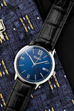 A Egard classic. This classic 40MM men's 3-hand automatic watch is made modern with a bold case and minimalist dial. Featuring a sapphire crystal, 5 atm water resistance, a Miyota automatic movement and a gorgeous blue sunburst dial. Men's Collection, Sapphire Crystal, The Man, Sapphire, Stainless Steel, Leather