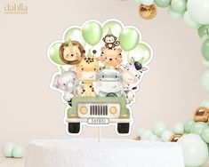 there is a cake topper with animals in the back of a truck on it