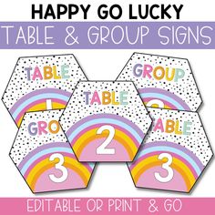 happy go lucky table and group signs with rainbows on the sides, in white background