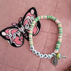 Elevate your bracelet game! Be the envy of all the Melanie Martinez fandom! Portals Bracelet, Melanie Martinez Bracelet, Bracelet Game, Portals Melanie Martinez, Melanie Martinez Portals, Clay Bead Bracelet, Clay Bracelet, Bracelet Ideas, Cute Bracelets