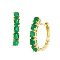 Ready to take her look to the next level with ease, these fabulous gemstone hoop earrings are simply perfect. Crafted in warm 14K gold, each oval-shaped hoop is lined along the front edge with five dazzling 4.0 x 3.0mm oval-shaped verdant-green emeralds. Buffed to a brilliant luster and sure to please, these dainty earrings secure with hinged backs. Fine Jewelry Oval Huggie Earrings With Prong Setting, Elegant Oval Hoop Earrings With Gemstone, 14k Gold Oval Huggie Earrings Fine Jewelry, Classic Yellow Gold Hoop Earrings With Gemstone, Yellow Gold Oval Huggie Earrings Fine Jewelry, Oval Huggie Earrings Fine Jewelry, Zales Zales, Stone Hoop Earrings, Gem Drop Earrings