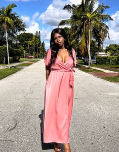 (Free shipping on all domestic orders over $100) Elevate your wardrobe with the luxury of the Eve Maxi Dress. Crafted from sumptuous polyester, this elegant wrap dress features a timeless V-neckline that is perfect for any occasion. Strut in style and make an elegant statement wherever you go. Fabric: The model is 5'7'' Made with a lightweight woven Size & Fit: Fit is true to size POLICYS View Our Shipping Policy View Our Return/Refund Policy Terms & Conditions HAVE A QUESTION? Contact Us Here Silk V-neck Dressy Maxi Dress, Chic Flowy V-neck Wrap Dress, Glamorous V-neck Dress For Wedding Guest, Silk V-neck Wrap Dress For Date Night, Chic Solid Dresses With Surplice Neckline, Chic Dress With Surplice Neckline, Evening V-neck Faux Wrap Dress, Dressy V-neck Dress With Surplice Neckline For Evening, Fitted Dressy Wrap Dress For Summer