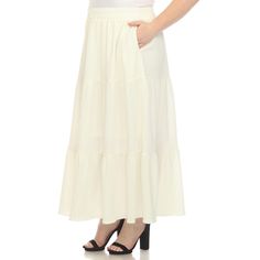 Elevate your fashion game with this flowy and effortlessly chic skirt. This maxi skirt from White Mark boasts a pleated design that adds texture, movement, and a touch of sophistication to your look. Dress it up or down as this skirt is incredibly versatile. Pair it with a tucked in blouse and heels for a sophisticated look or go for a more relaxed vibe with a tucked in tee and sandals and pair it with a jacket on chilly days. It’s perfect for various occasions and style preferences. Flowy Tiered Maxi Skirt In Cream, Cream Flowy Tiered Maxi Skirt, Cream Tiered Maxi Skirt, White Tiered Skirt With Pleated Hem, Flowy Pleated Full Maxi Skirt, White Flared Pleated Skirt With Elastic Waistband, White Full Skirt With Elastic Waistband, White Flowy Maxi Skirt With Pleated Hem, White Tiered Pleated Skirt With Elastic Waistband