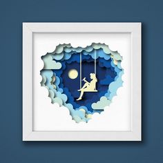 a paper cut artwork of a girl swinging on a swing in the sky with moon and clouds